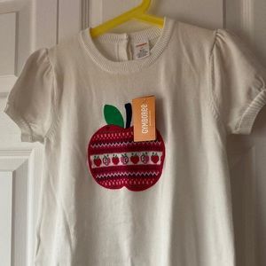New with tags. Gymboree apple sweater dress. Short sleeve